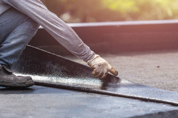 Professional Waterproofing technician working in Auburn University, AL